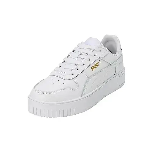 Zapatillas Puma Carina Street con detalles dorados y suela de plataforma